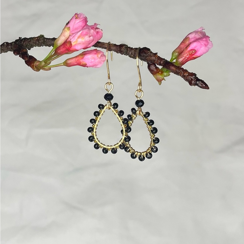 Gold tone/black beaded dangle earring